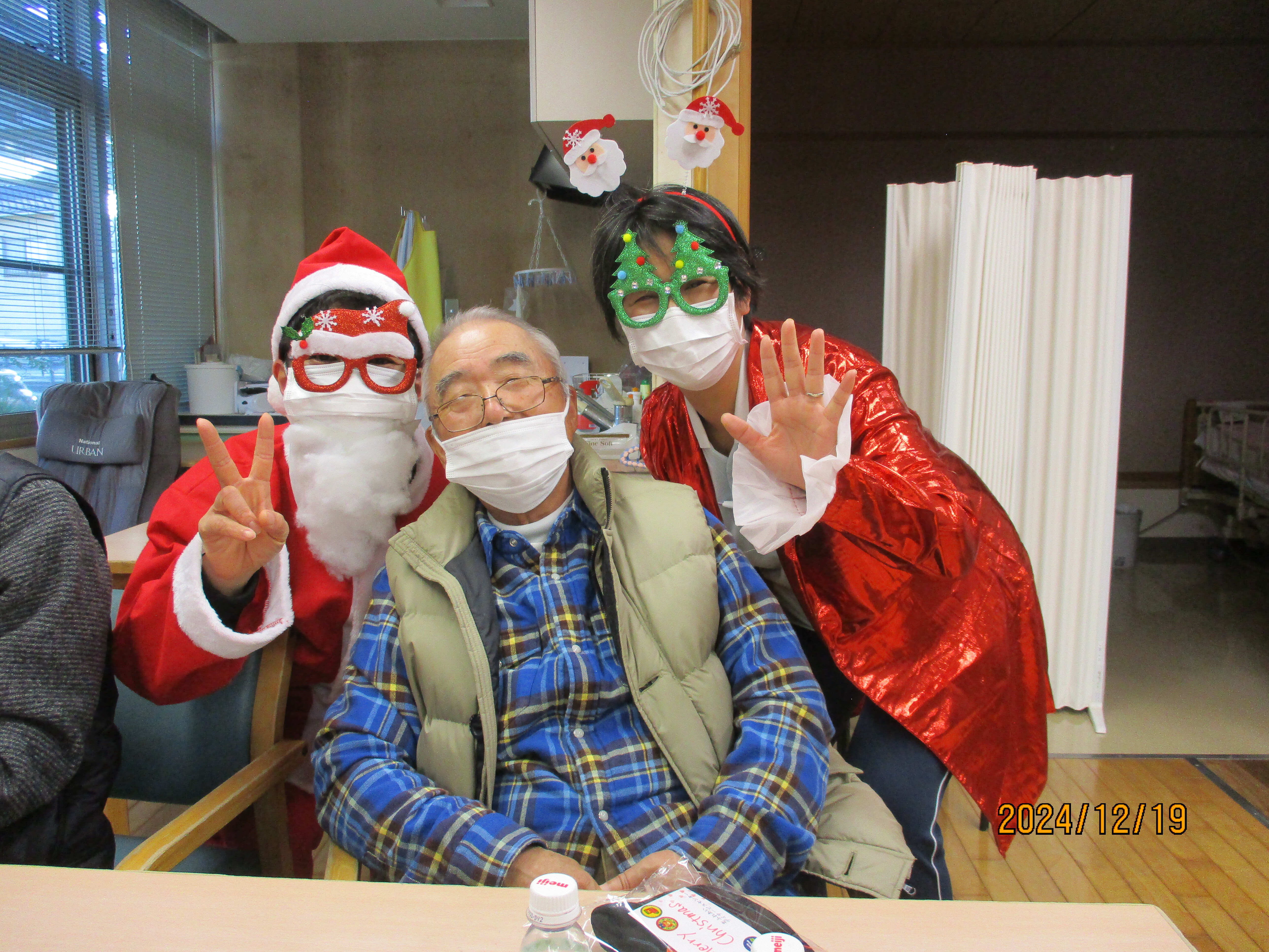 サンタさんと一緒に写った写真